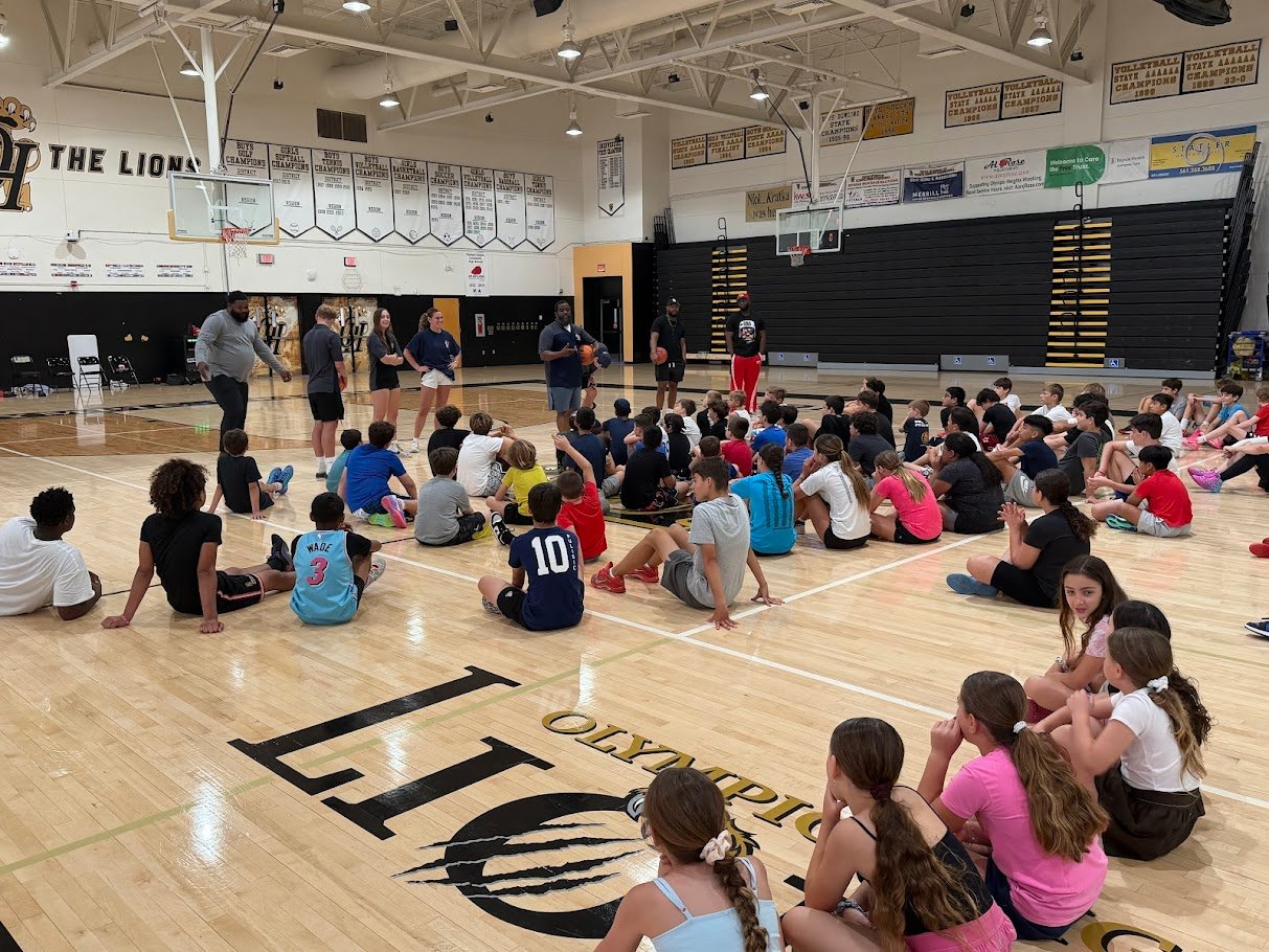 Large group of boys and girls at Boca Basketball summer camp at Olympic Heights High School